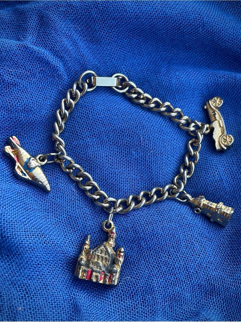 Chitty Chitty Bang Bang Vintage Gold-Tone Charm Bracelet with Blue & Red Accents